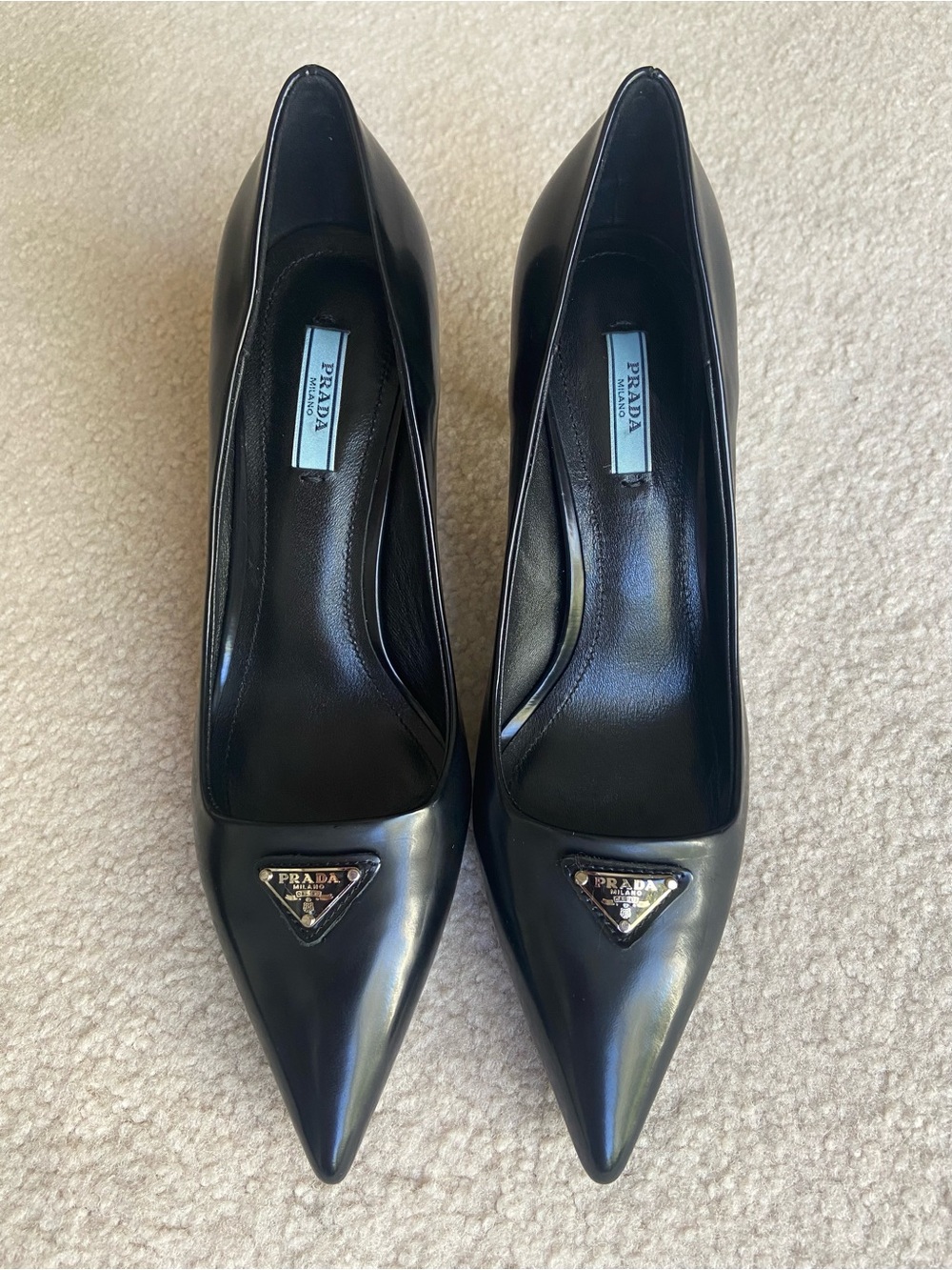 NWOB MSRP $1200 Prada Black Pointed Toe Leather Pumps with triangle logo size 37
